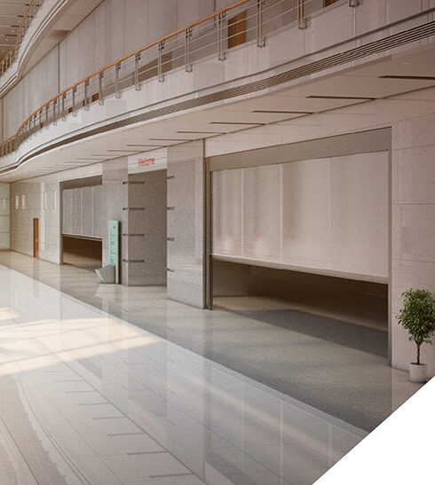 Certified Tecnitex fire curtains deployed in a corporate hallway, compliant with EN 1634-1 and EN 13501-2 standards