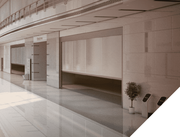 Tecnitex fire curtain fully deployed in a commercial passageway, ensuring sectorisation and fire containment