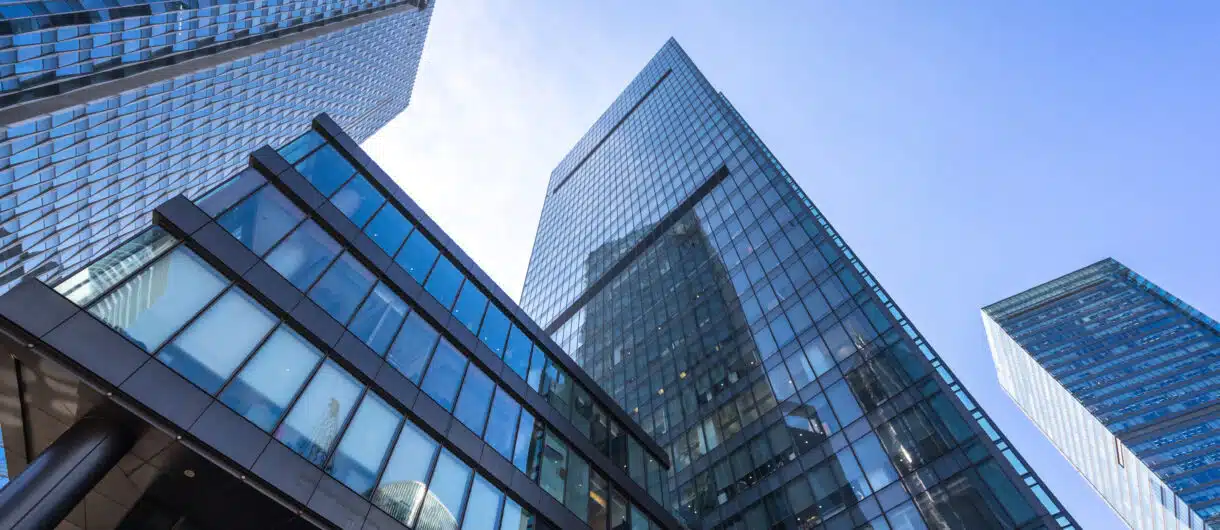 High-rise glass buildings requiring advanced fire protection systems with automatic fire curtains